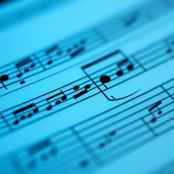 Musical staff illustrating the two distinct sections of binary form with contrasting melodies and harmonies